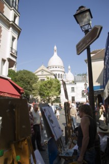 FRANCE, Ile de France, Paris, Montmartre Tourists walking past artists painting in Place du Tertre