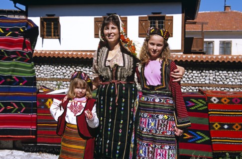 BULGARIA, Bansko, Mother and daughters wearing national costume