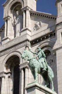 FRANCE, Ile de France, Paris, Montmartre The facade of the church of Sacre Couer with the bronze