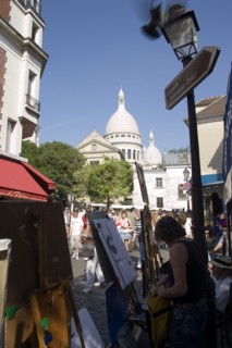 FRANCE, Ile de France, Paris, Montmartre Tourists walking past artists painting in Place du Tertre