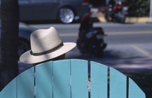 USA, Florida, Miami, South Beach. Ocean Drive. The head of a man wearing a Panama hat seen above