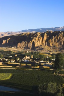 AFGHANISTAN, Bamiyan Province, Bamiyan , View of Bamiyan valley and village showing cliffs with