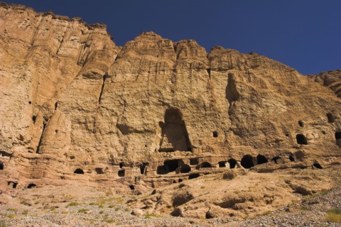 AFGHANISTAN, Bamiyan Province, Bamiyan , Caves in cliffs near empty niche where the famous carved