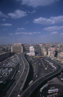 EGYPT, Cairo Area, Cairo, Elevated view over busy road network and tall city buildings
