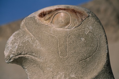 EGYPT, Nile Valley, Thebes, Deir-el-Bari. Hepshepsut Mortuary Temple. Carved statue  of the God