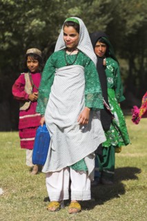 AFGHANISTAN, Ghor Province, Pal-Kotal-i-Guk, "Aimaq nomad camp, Women and girl carry containers
