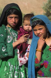 AFGHANISTAN, Ghor Province, Pal-Kotal-i-Guk, "Aimaq nomad camp, Aimaq girls and baby in front of