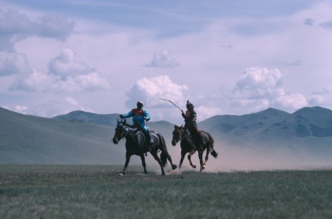MONGOLIA, Animals, Child jockeys competing in National Day horse race.