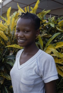 NIGERIA, People, Three-quarter portrait of smiling young Ibo girl
