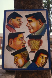 MALI, Bamako, Sign outside hairdresser’s shop advertising different hair cuts.