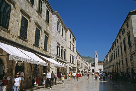 CROATIA, Dalmatian Coast, Dubrovnik, Looking along Stradun to Bell tower (Gradski Zvonik). Former