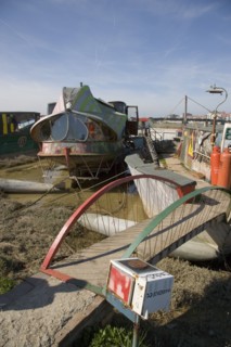 ENGLAND, West Sussex, Shoreham-by-Sea, "Houseboat moored along the banks of the river adur.  Former