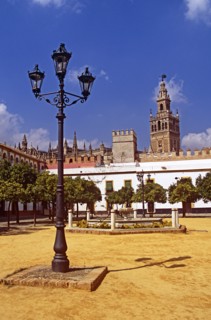 SPAIN, Andalucia, Seville, Cathedral and Patio de Banderas.