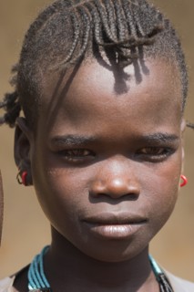 ETHIOPIA, Lower Omo Valley, Key Afir, Tsemay girl at weekly market