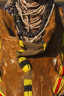 ETHIOPIA, Lower Omo Valley, Mago National Park, Womans traditional goatskin dress