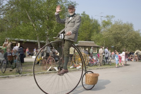 ENGLAND, West Sussex, Amberley, Amberley Working Museum. Veteran Cycle Day Grand Parade. Man