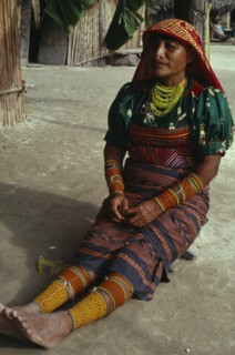 PANAMA, San Blas Islands, Kuna Indians, Kuna Indian woman wearing brightly coloured traditional
