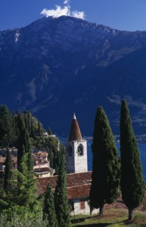 ITALY, Lombardy, Lake Garda, "Pieve.  View of tiled rooftops, church and bell tower of village