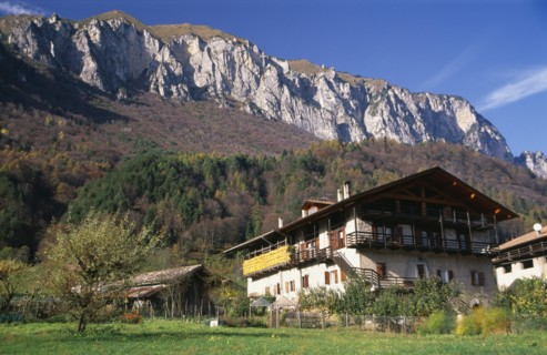 ITALY, Trentino-Alto Adige, Lake Garda Area, "Alpine farmstead near Lago di Tenno.  Traditional