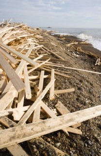 ENGLAND, West Sussex, Worthing, Timber washed up on the beach from the Greek registered Ice