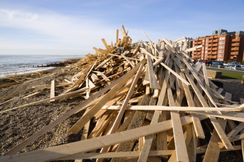 ENGLAND, West Sussex, Worthing, Timber washed up on the beach from the Greek registered Ice