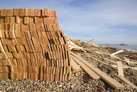 ENGLAND, West Sussex, Worthing, Timber washed up on the beach from the Greek registered Ice
