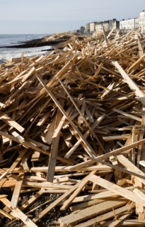 ENGLAND, West Sussex, Worthing, Timber washed up on the beach from the greek registered Ice