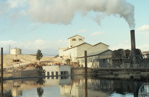 TUNISIA, Industry, Phosphates refinery near Metlaoui with plume of smoke rising from chimney at