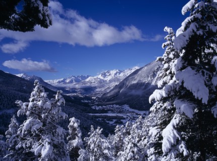 FRANCE, Provence-Cote d’Azur, Hautes-Alpes, View west from Col de Montgenevre over snow covered