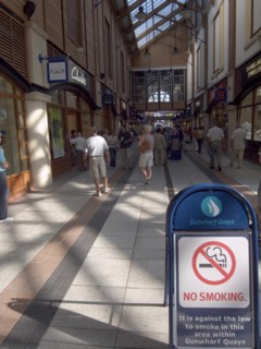 ENGLAND, Hampshire, Portsmouth, No Smoking sign in the Gunwharf Quays shopping complex