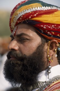 INDIA, Rajasthan, Jaisalmer, Head and shoulders side profile portrait of a Mr Desert contestant