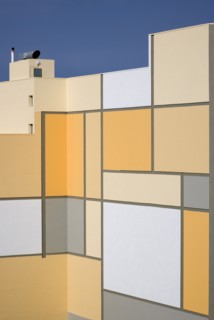MALTA, Paceville, Stepped structure of seaside building with pattern of square coloured decoration