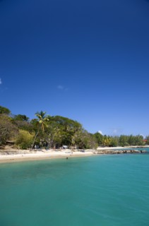 WEST INDIES, St Lucia, Gros Islet , Pigeon Island National Historic Park Tourists on the beach