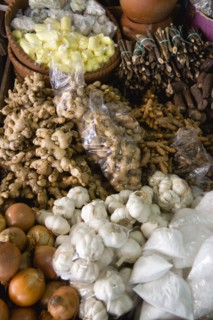 WEST INDIES, St Lucia, Castries, "Market stall with local produce of herbs and spices including