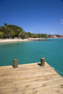 WEST INDIES, St Lucia, Gros Islet , Pigeon Island National Historic Park Tourists on the beach