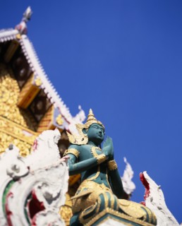 THAILAND, North, Chiang Mai, "Green and gold painted statue of Rama, an incarnation of Vishnu often