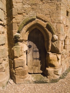 ENGLAND, East Sussex, Battle, Battle Abbey. Detail of wooden gate