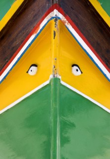 MALTA, Marsaxlokk , Fishing village harbour on the south coast with colourful Kajjiki fishing boat