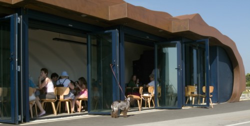 ENGLAND, West Sussex, Littlehampton, Customers sitting at tables inside the East Beach Cafe