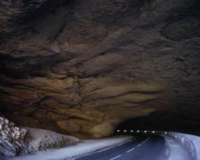 FRANCE, Midi-Pyrenees, Ariege, Grotte du Mas d’Azil drive through cave.  North entrance.