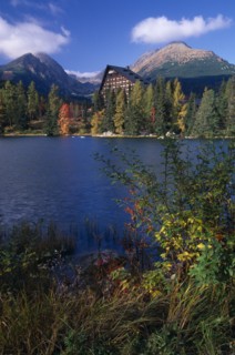 SLOVAKIA, Carpathian Mtns, High Tatras Mtns, Strbske Pleso.  View across lake towards chalet and