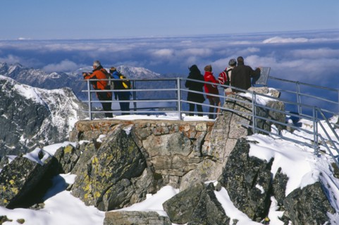 SLOVAKIA, Carpathian Mtns, High Tatras Mtns, People at the Lomnicky Stit viewpoint with views
