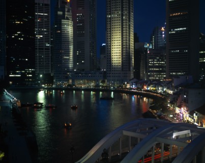 SINGAPORE, Cityscape, Singapore river basin at night with city skyscraper lights reflected in the