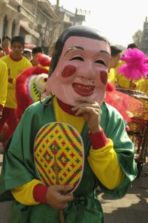 THAILAND, North, Chiang Mai, "Chinese New Year celebrations. Dwarf in parade, Warorot Market area