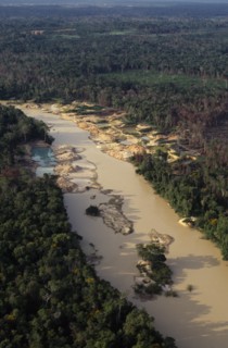 BRAZIL, Matto Grosso, Peixoto de Azevedo, Aerial view over Peixoto River. Now a Garimpo  Gold mine