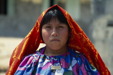 PANAMA, San Blas Islands, Kuna Indigenous Tribe, Portrait of young Kuna Indian girl wearing