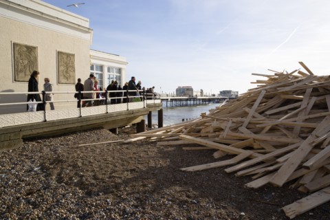 ENGLAND, West Sussex, Worthing, Timber washed up on the beach from the Greek registered Ice