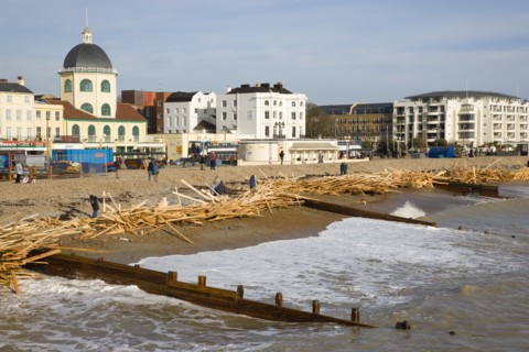 ENGLAND, West Sussex, Worthing, Timber washed up on the beach from the Greek registered Ice