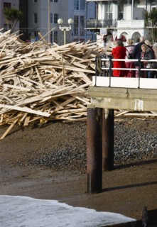 ENGLAND, West Sussex, Worthing, Timber washed up on the beach from the Greek registered Ice