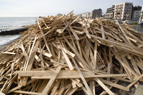 ENGLAND, West Sussex, Worthing, Timber washed up on the beach from the Greek registered Ice